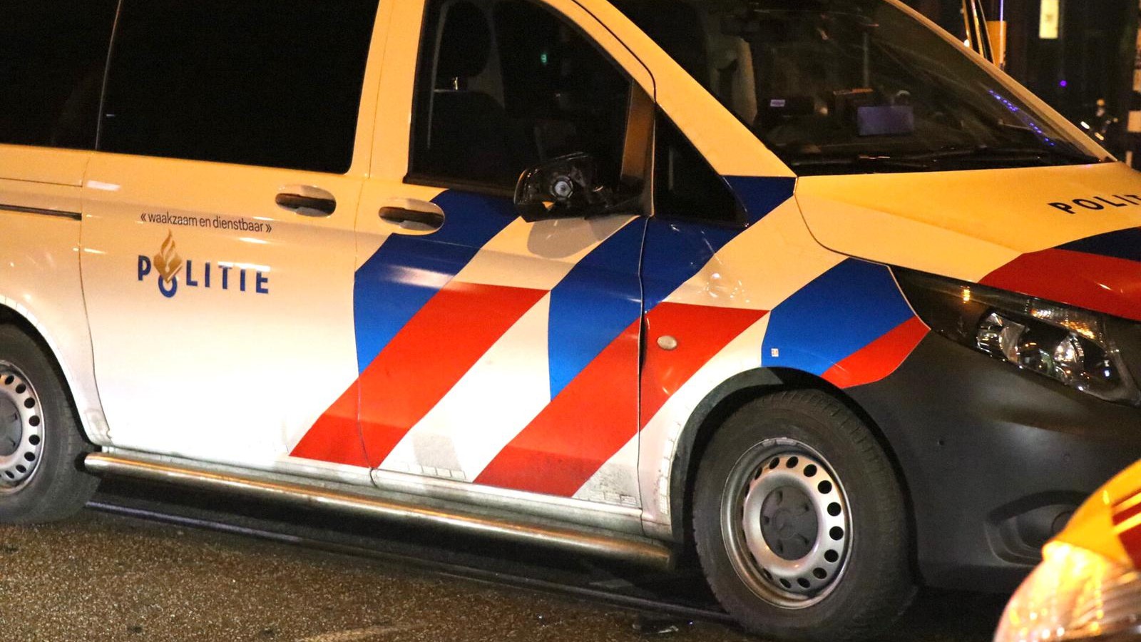 Fietser zwaargewond na aanrijding met politieauto op Rozengracht