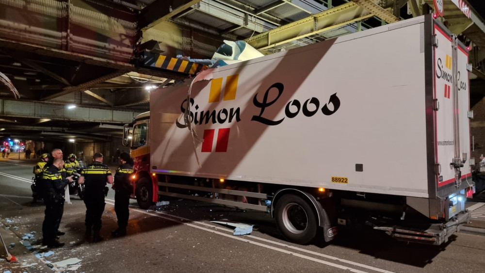 Train traffic stopped due to truck that rams under the railway bridge