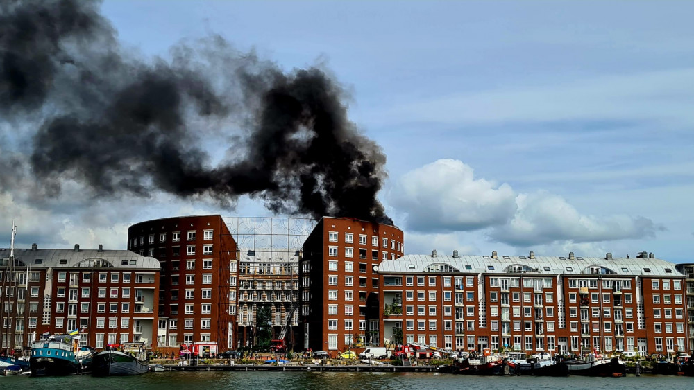 Major fire in home on KNSM island, top three floors evacuated