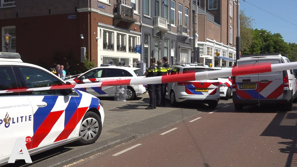 Verwarde man in Frederikspleinbuurt gooit spullen uit raam, arrestatieteam grijpt in