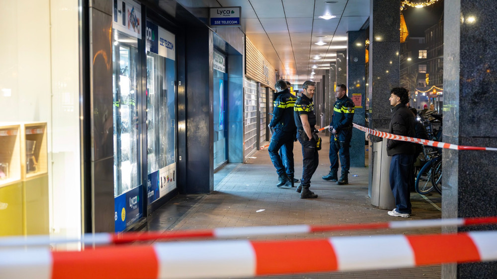 Telecomwinkel op Kinkerstraat overvallen, man aangehouden
