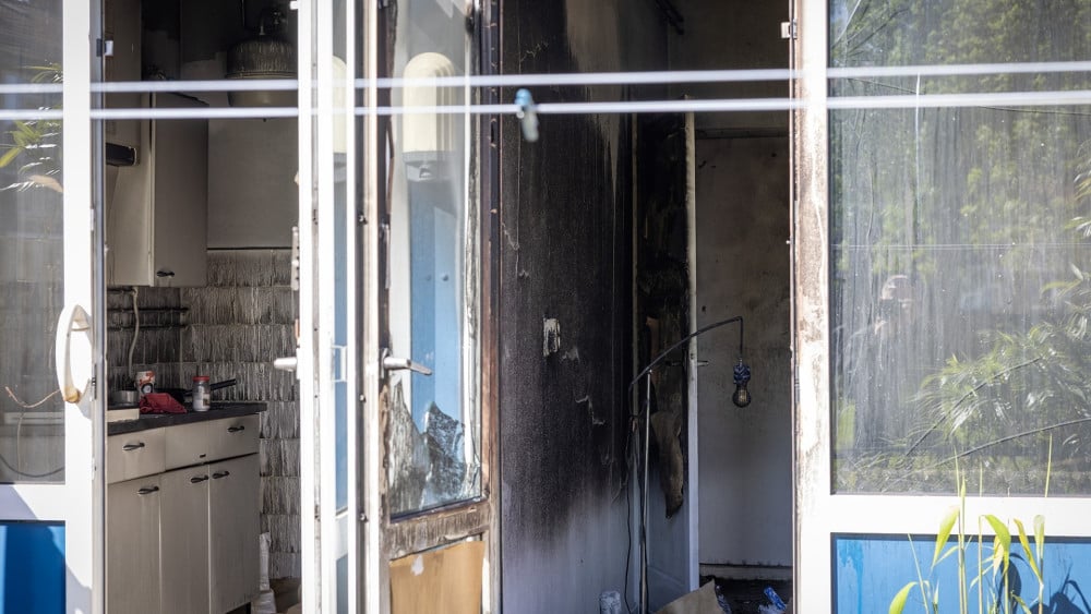 Veel schade na woningbrand op Louis Couperusstraat
