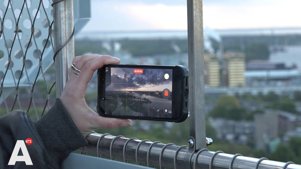 Early birds watch sunrise atop A'dam Tower for its anniversary